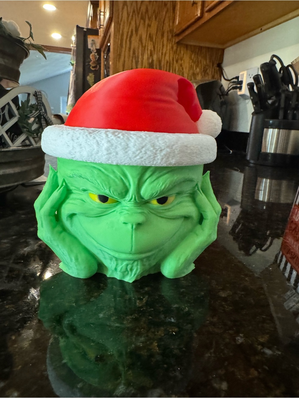 Green Grinch Holiday Figurine with Red Santa Hat